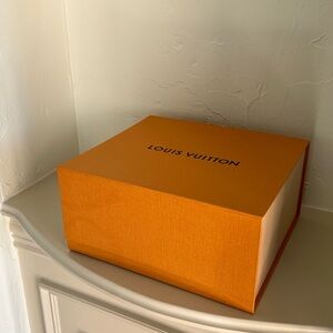 Louis Vuitton 12x11x6 deep magnetic closure box with original ribbon, and card